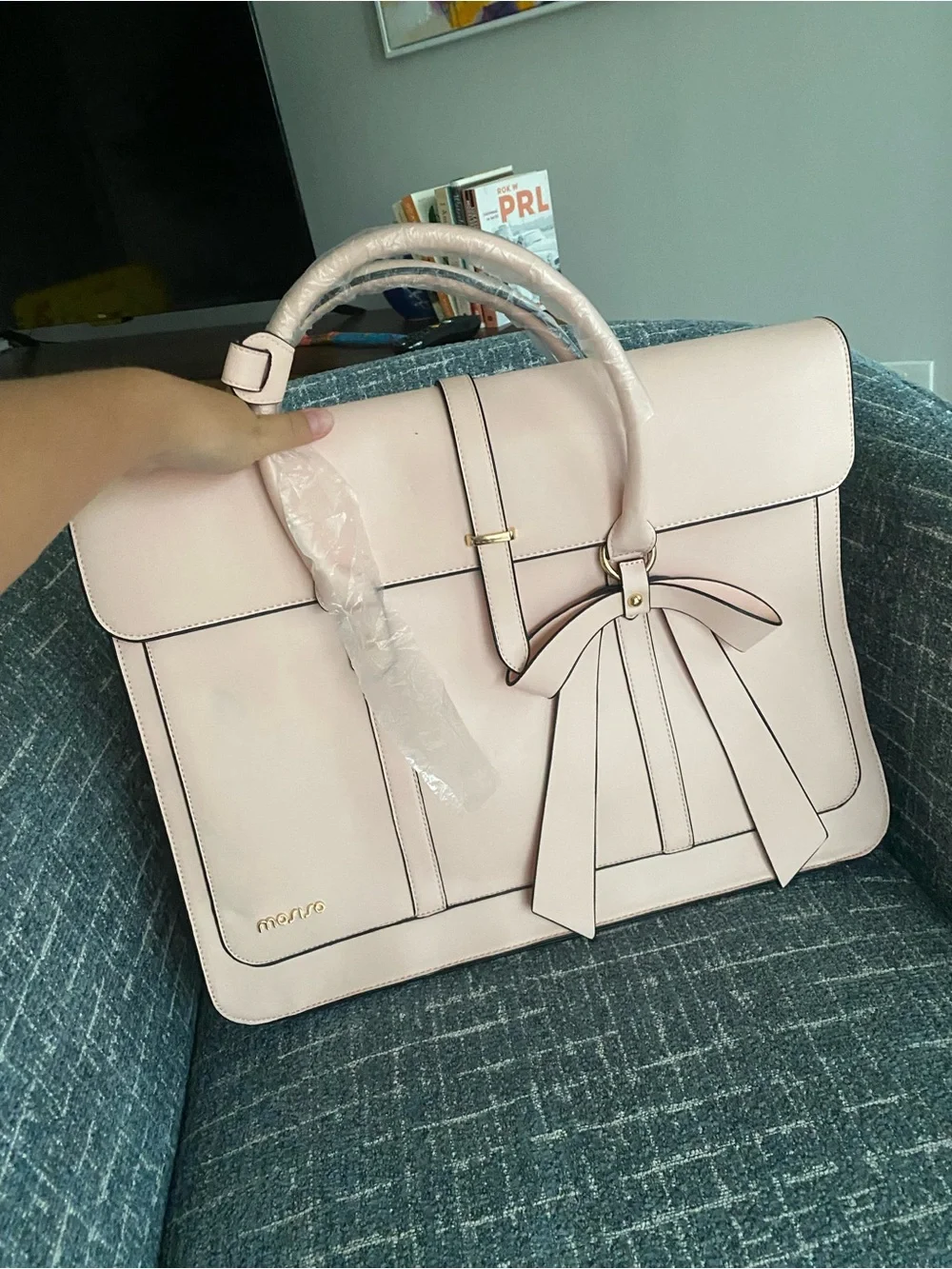 Huge pink bag that fits a laptop